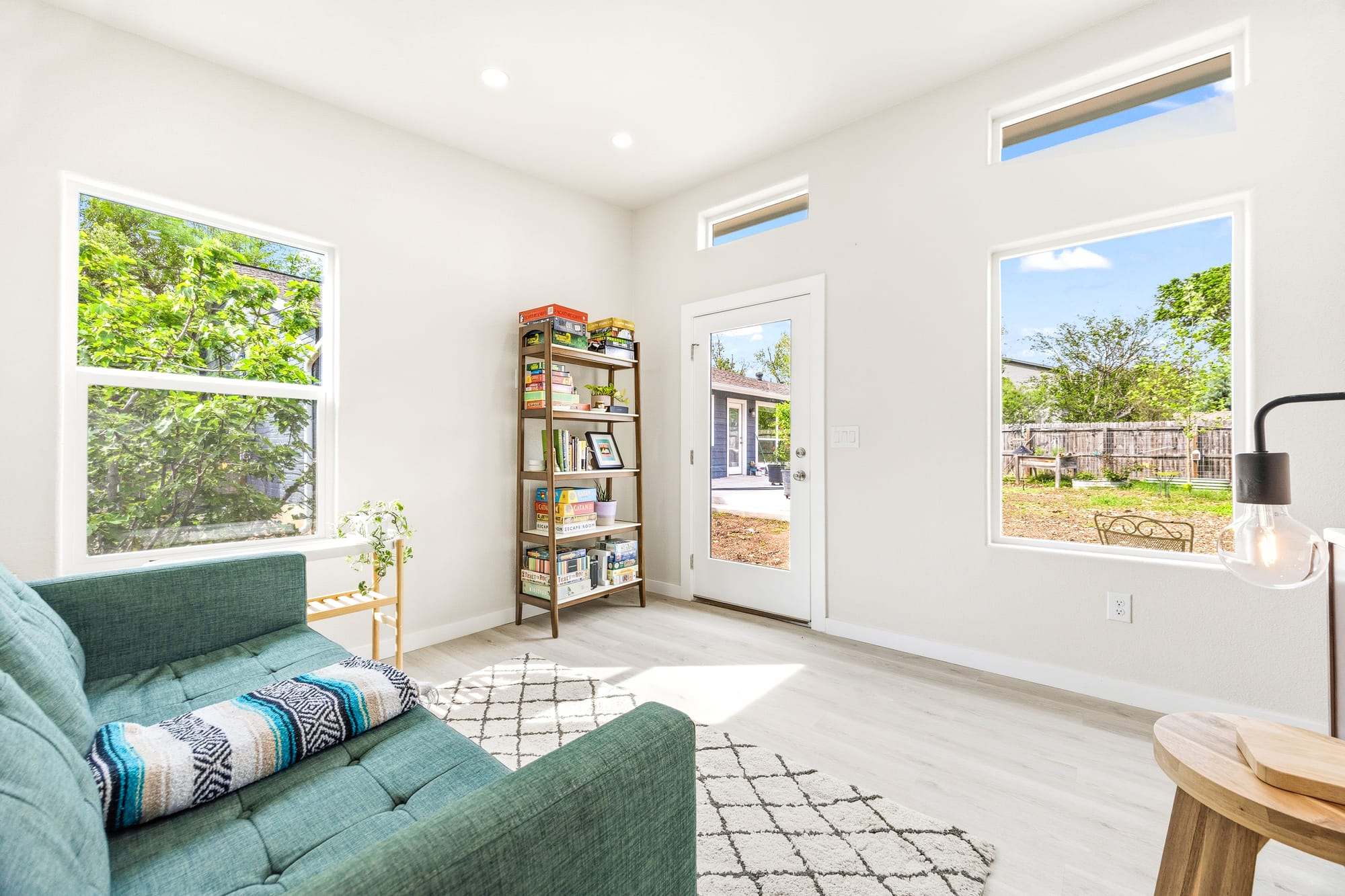 Open living area with windows and entry