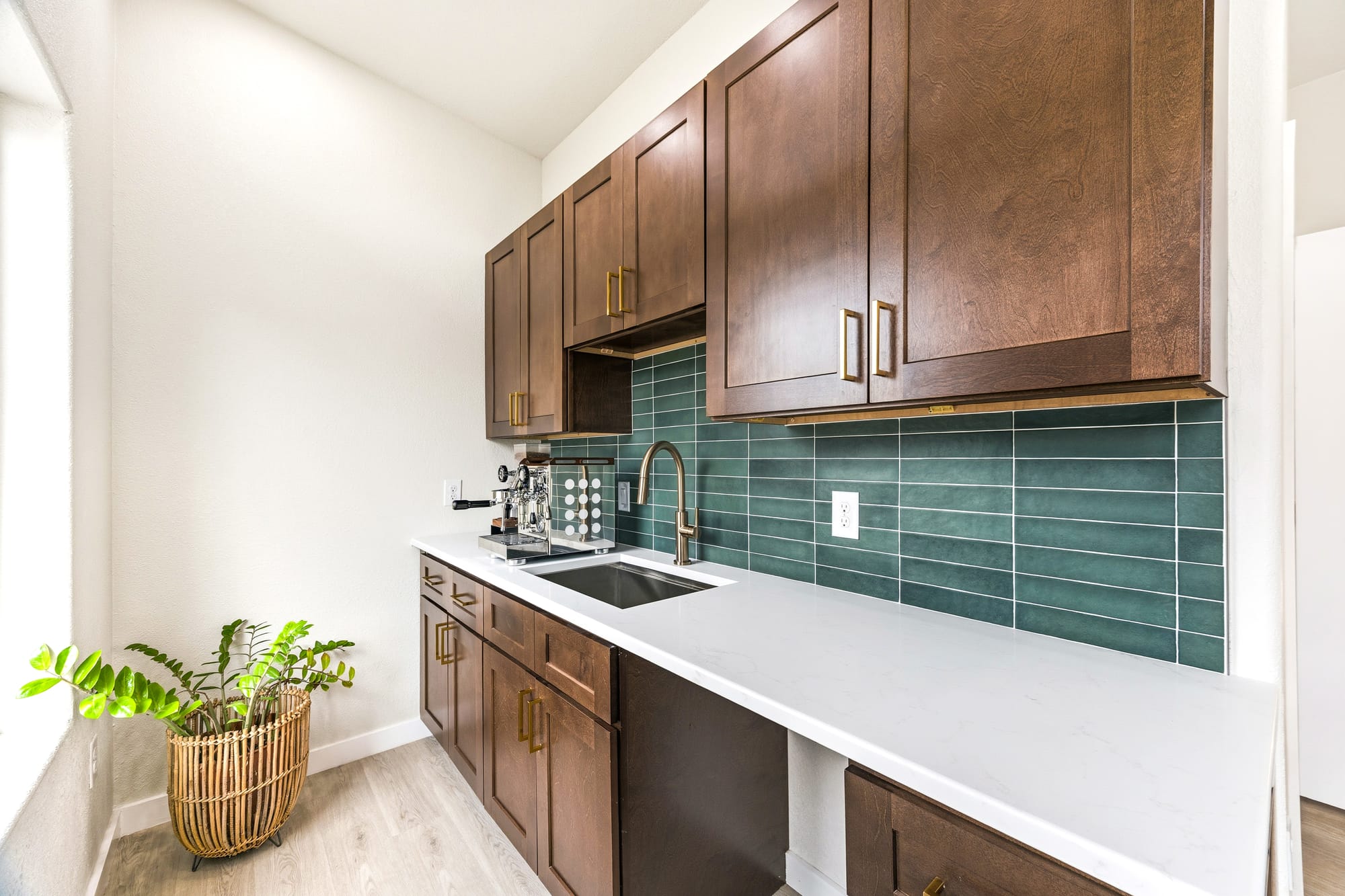 Kitchenette with sink and espresso bar