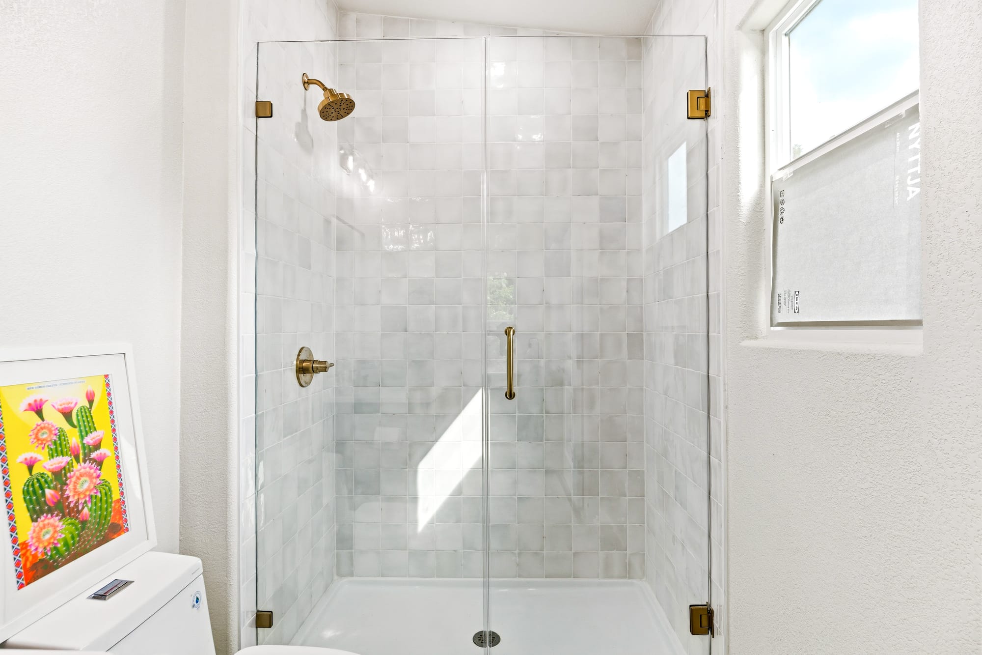 Shower with glass enclosure
