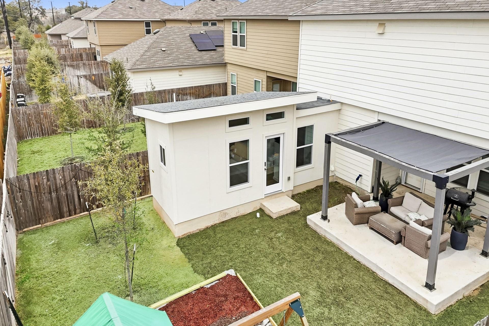 Aerial view of backyard and patio