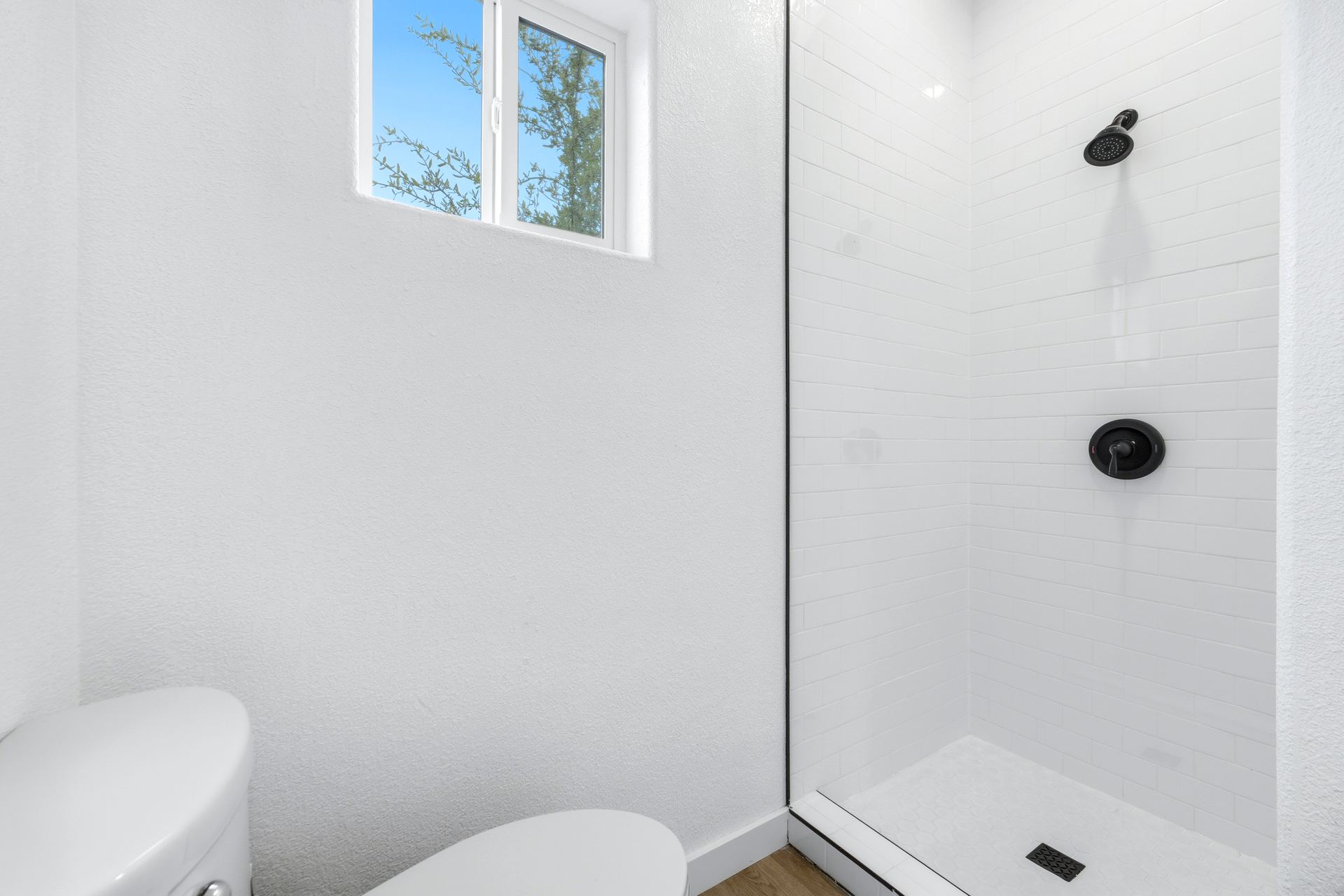 Bathroom with shower and toilet