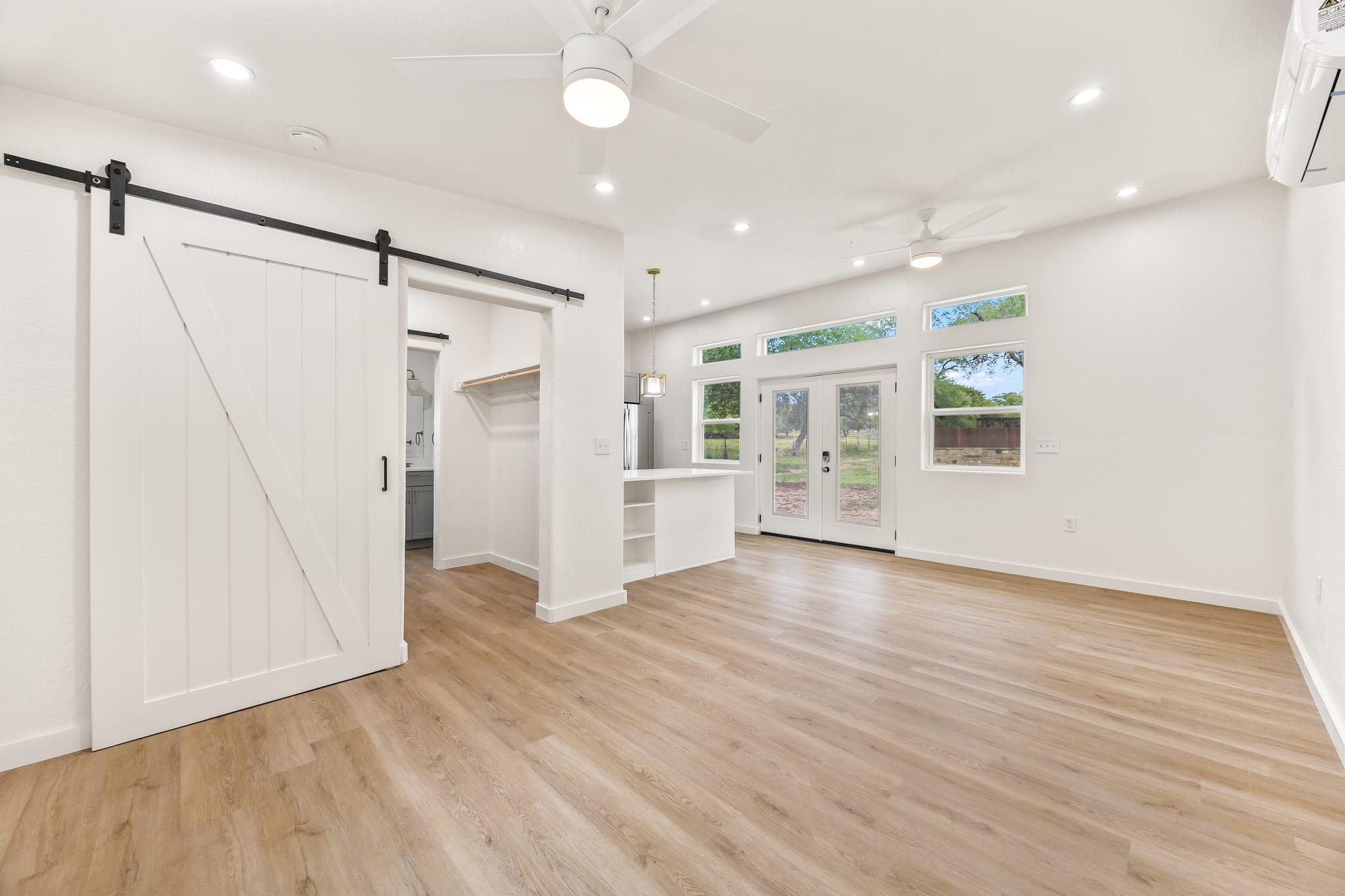 Open floor plan spanning living and kitchen