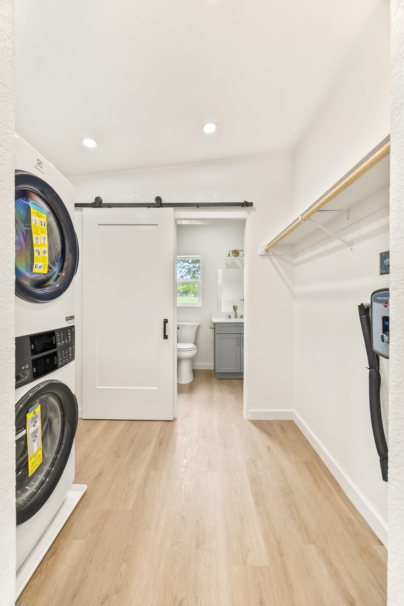 Laundry behind the barn door, open
